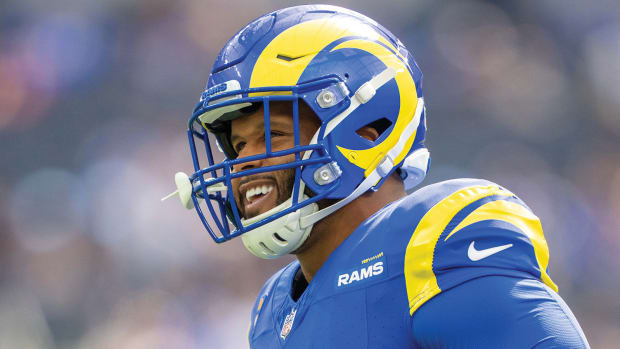 Los Angeles Rams defensive tackle
                                                                                 Aaron Donald smiles before a game at
                                                                                 SoFi Stadium.